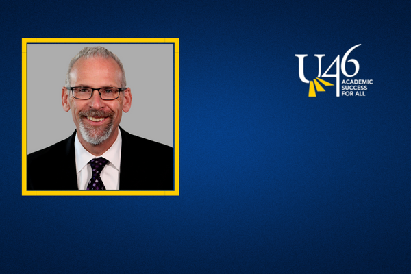  Photo of Tony Sanders on blue background in yellow frame